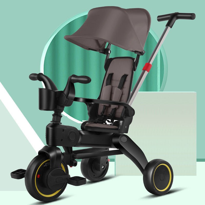 poussette-trycicle-grise-volant-guide-dossier-inclibable-barre-de-sécurité-plaiable-pedale-pratique-bebe-velo-coordination