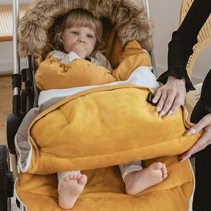 chanceliere-bebe-confortable-abordable-must-have-parent-activité-quotidienne-avec-bébé-hiver-promenade
