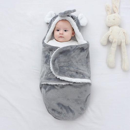 nid-d'ange-bebe-gris-éléphant-couverture-emmaillotage-allure-animal-accessoire-voyage-sommeil-bébé-cocon-douillet-chaleureux-nourrisson