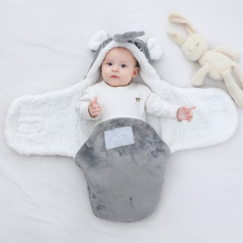 nid-d'ange-bebe-gris-éléphant-couverture-emmaillotage-allure-animal-accessoire-voyage-sommeil-bébé-cocon-douillet-chaleureux-nourrisson-rituel-semblable-meilleur-sommeil-sentiment-appartenance-cocon-amour