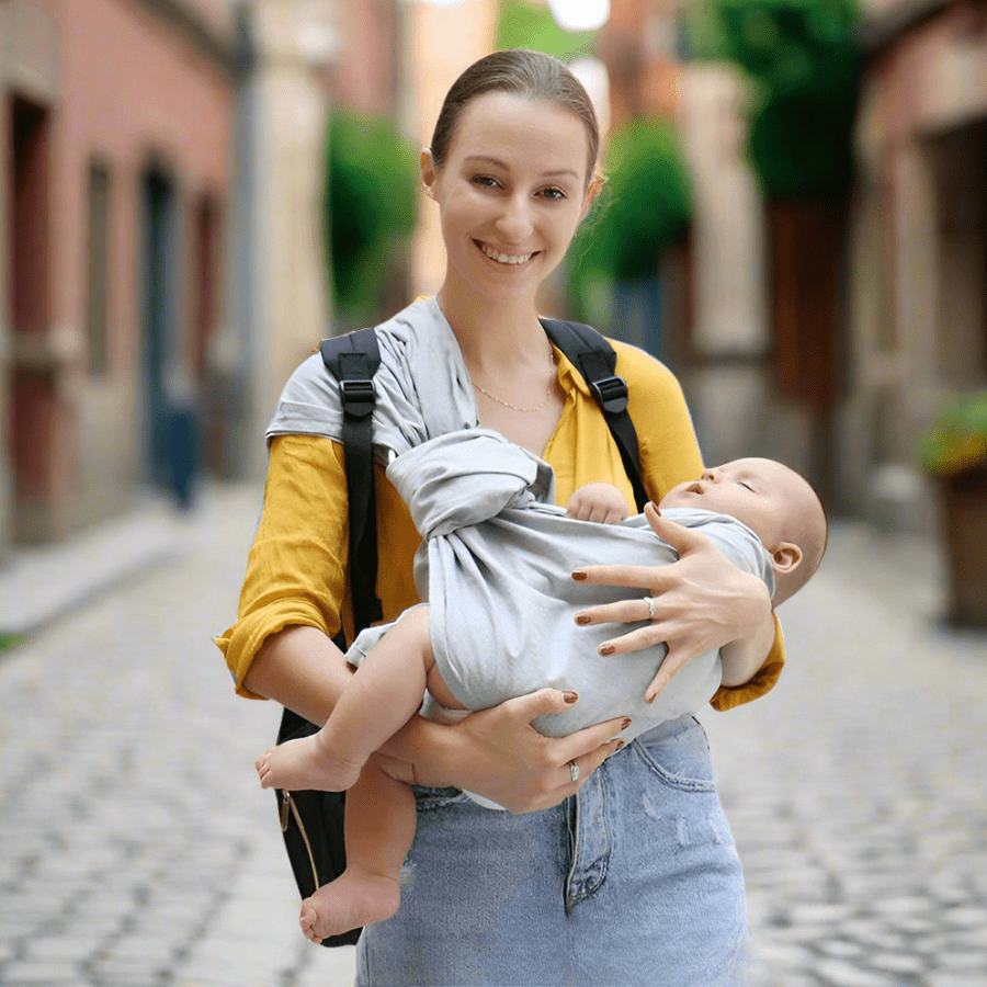 echarpe-de-portage-grise-style-soutien-optimal-bonne-epaulement-repartition-poids-egale-grey-must-have-joie-de-bébé-boutique-accessoire-voyage
