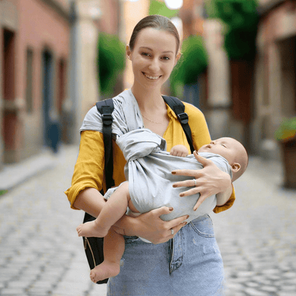 echarpe-de-portage-grise-style-soutien-optimal-bonne-epaulement-repartition-poids-egale-grey-must-have-joie-de-bébé-boutique-accessoire-voyage