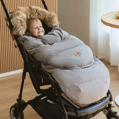 chanceliere-bebe-accessoire-balade-hiver-sorties-parent-avec-bébé-air-frais-joie-de-bébé