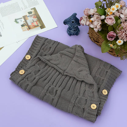 nid-d'ange-bebe-enveloppe-chaleureuse-tricot-laine-enmitoufler-joie-de-bébé-tricotti-gigoteuse-bébé-grise-accessoire-voyage-sieste