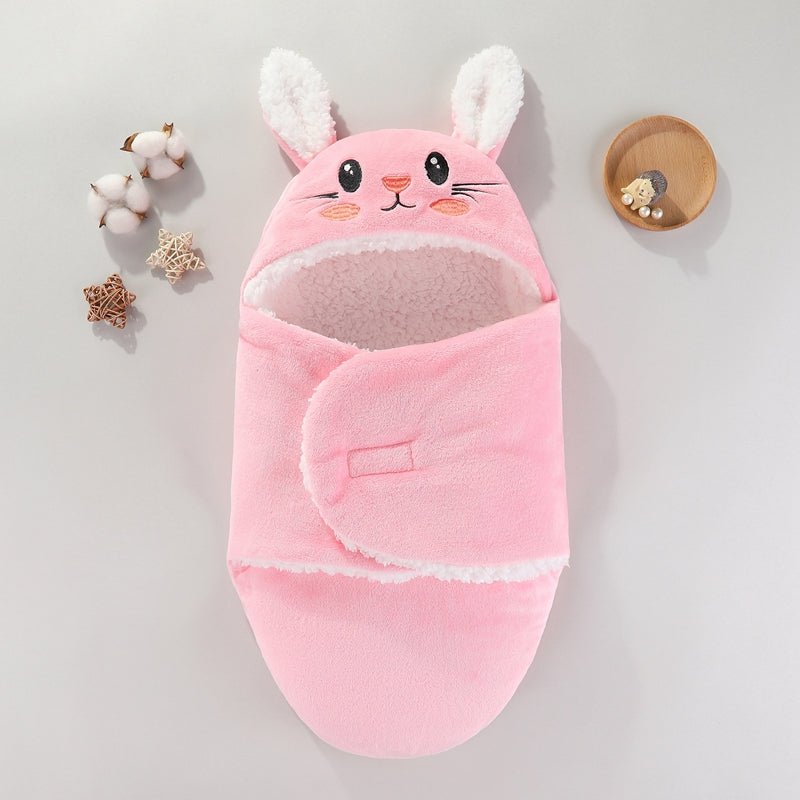 nid-d'ange-rose-lapin-joie-de-bébé-accessoire-voyage-bébé-couverture-emmaillotage-sieste-rituel-sieste-sortie-chez-ami