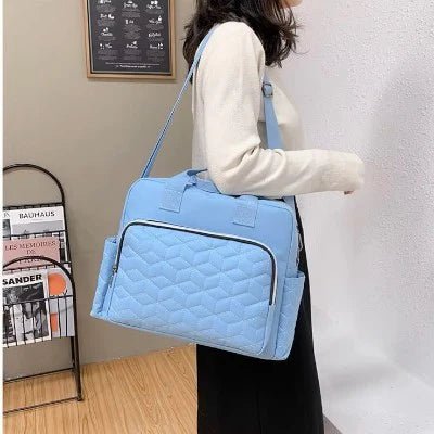 sac-a-langer-bandouliere-sac-a-main-joie-de-bébé-bleu-ciel-espace-généreuse