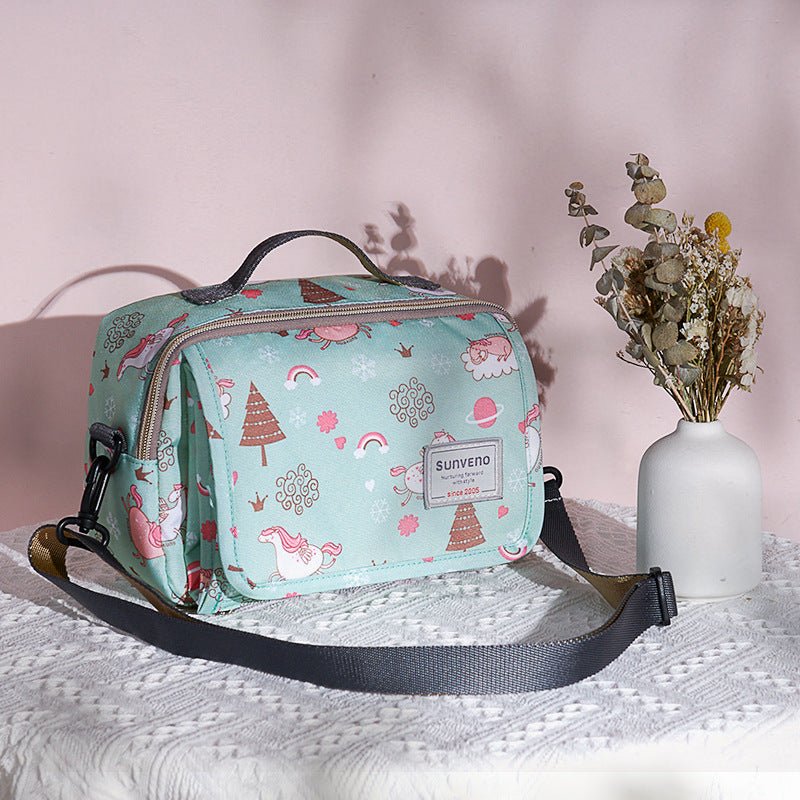 sac-a-langer-matelas-langer-station-vert-teal-turquoise-licorne-arc-en-ciel-sapin-coloré-accessoire-transport-sorties-baalde-bebe-joie-de-bébé