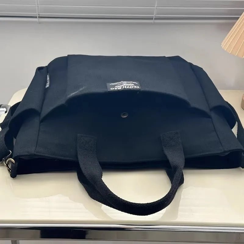 sac-a-langer-eleganzia-cloth-bag-bébé-noir-plusieurs-compartiments